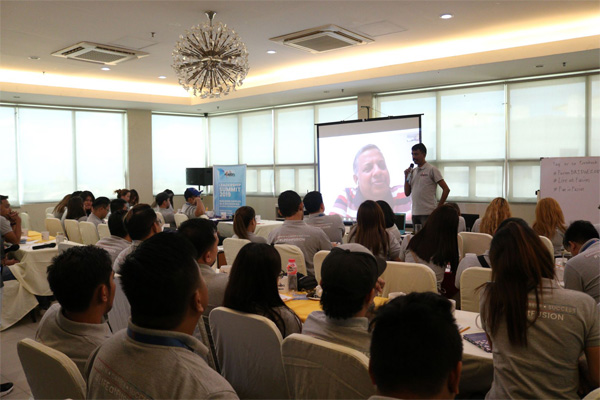 Audience watching a presentation at the Fusion CX BRIDGE 2019 event