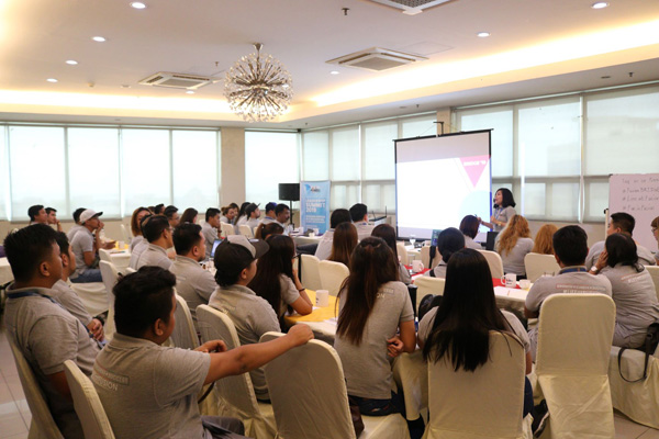 Attendees seated in a conference hall during a BRIDGE 2019 session