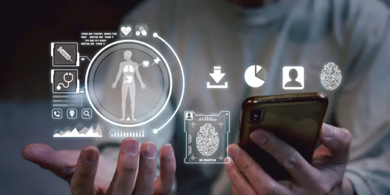 Hand holding a phone with medical imaging and health data icons