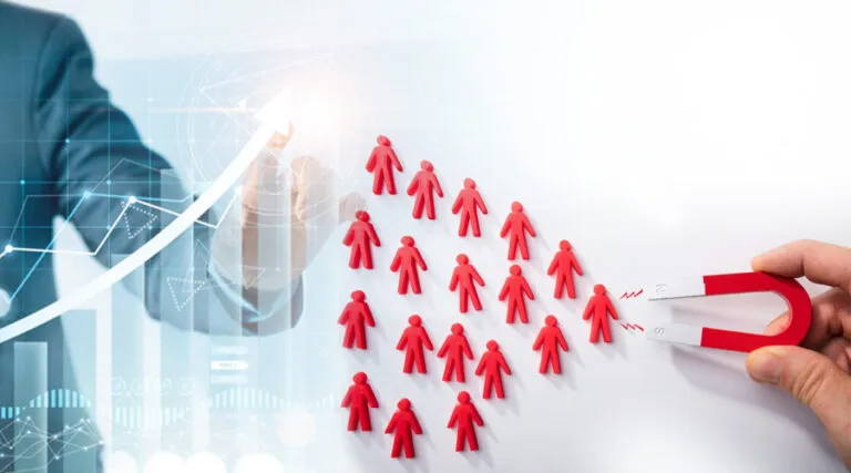 Magnet attracting a crowd of red figures, representing lead generation